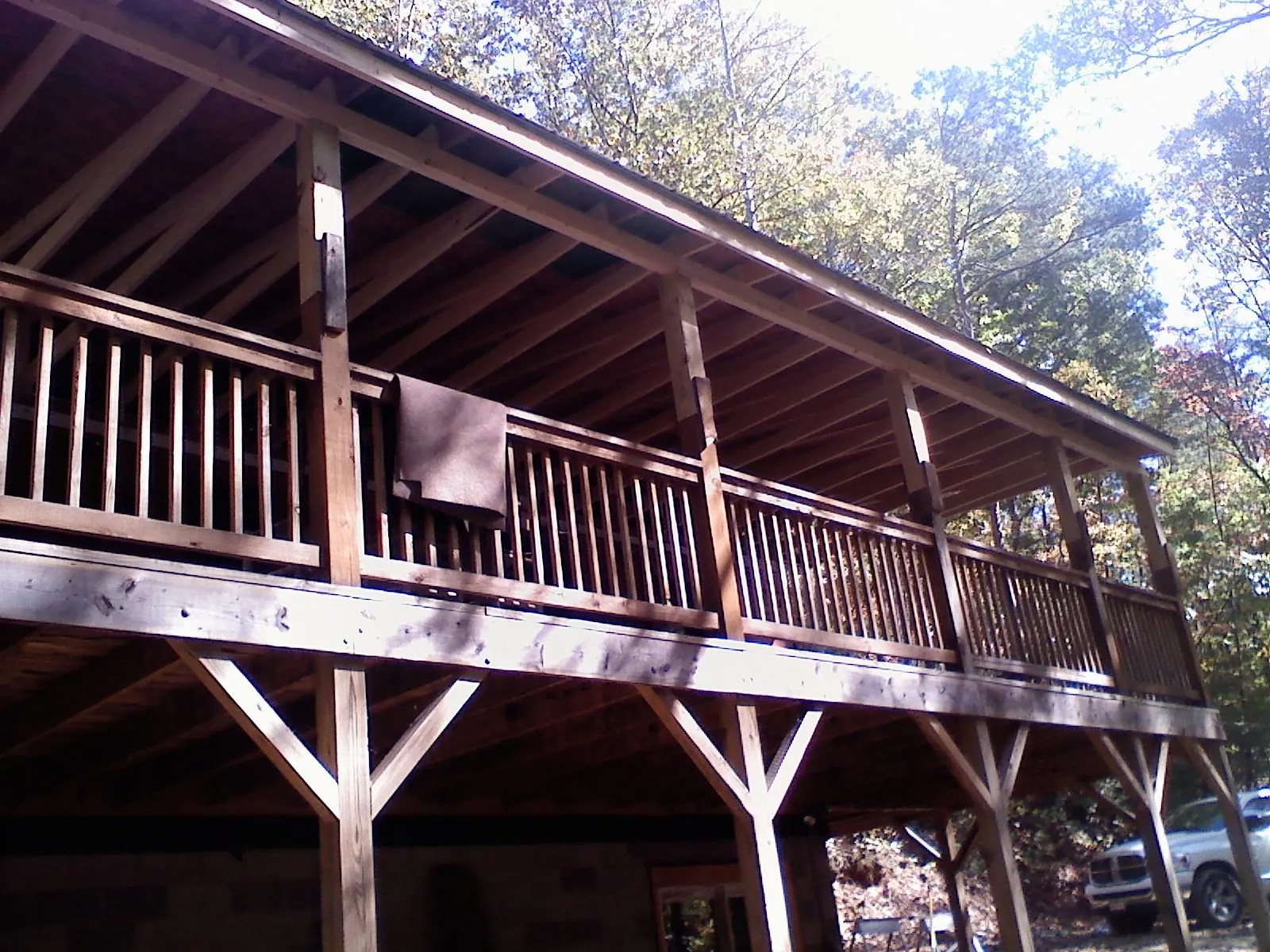 Timber framing under a new elevated porch and deck — Roof Leak Repair in Grand Saline by Roofing Brothers